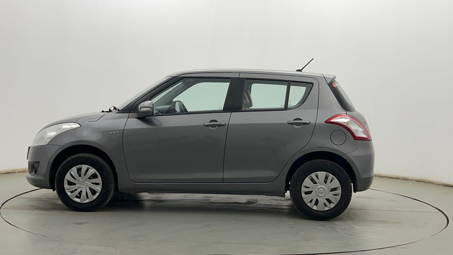 Used 2013 Maruti Suzuki Swift VXi Petrol Manual exterior LEFT SIDE VIEW
