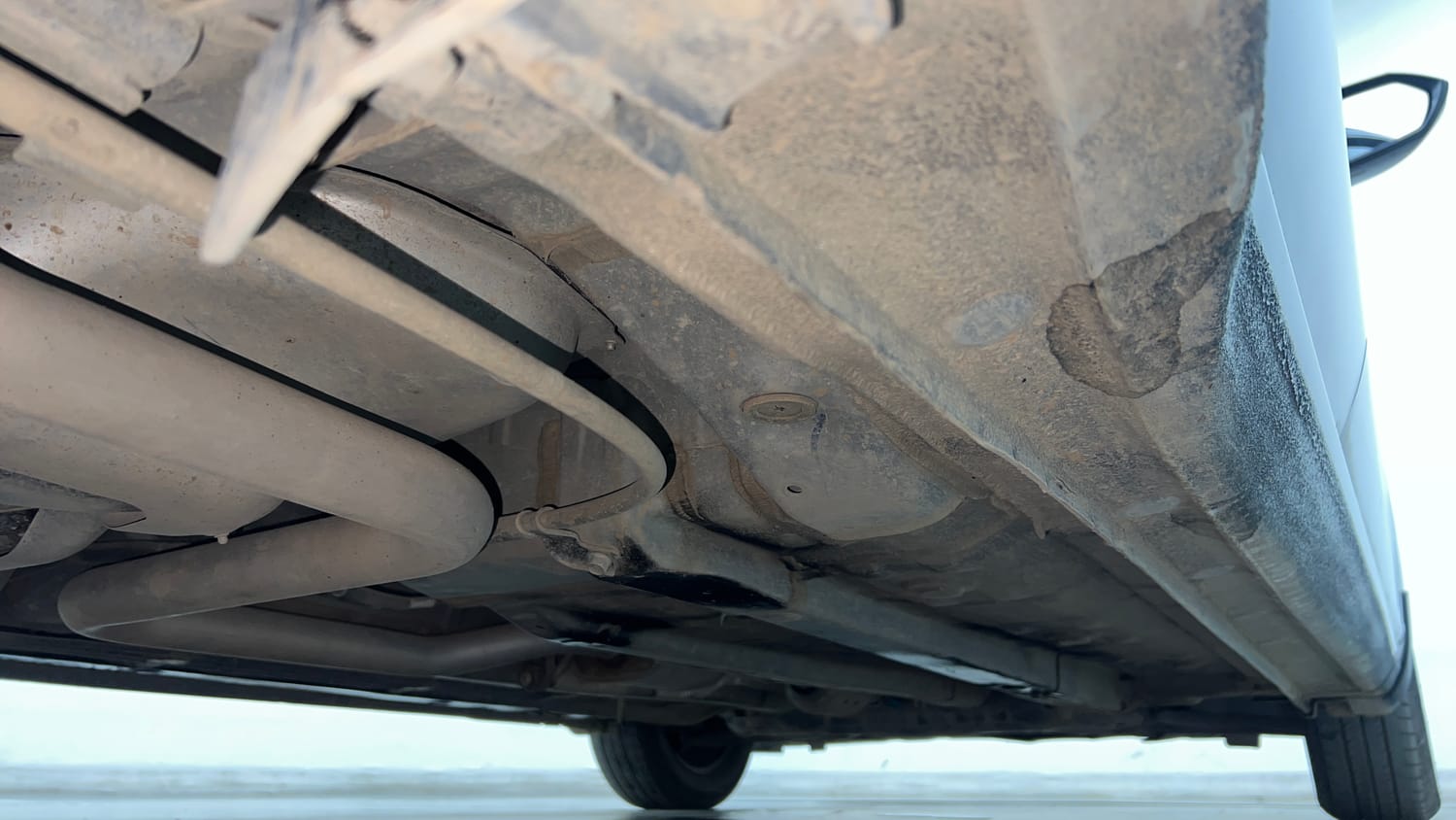 Used 2023 Hyundai Verna EX 1.5 Petrol MT Petrol Manual extra REAR RIGHT UNDERBODY VIEW