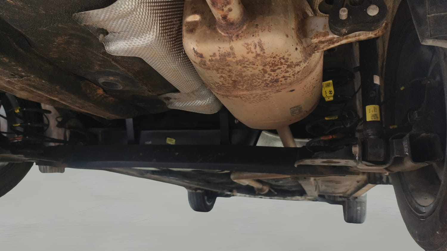 Used 2022 Hyundai Aura SX 1.2 Petrol Petrol Manual extra REAR RIGHT UNDERBODY VIEW