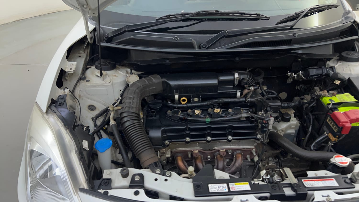 Used 2018 Maruti Suzuki Dzire VXi AMT Petrol Automatic engine ENGINE RIGHT SIDE HINGE & APRON VIEW