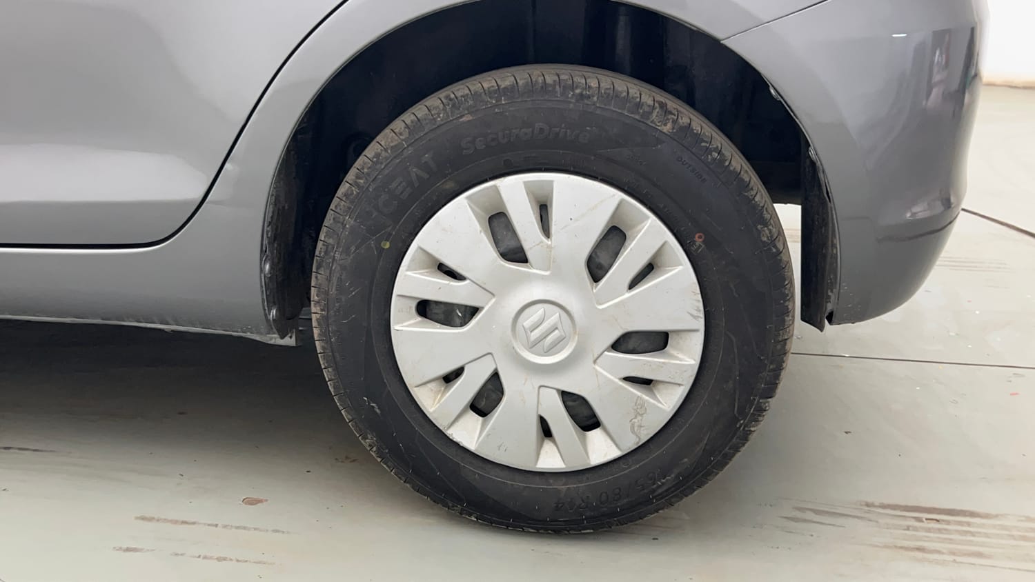 Used 2013 Maruti Suzuki Swift VXi Petrol Manual tyres LEFT REAR TYRE RIM VIEW