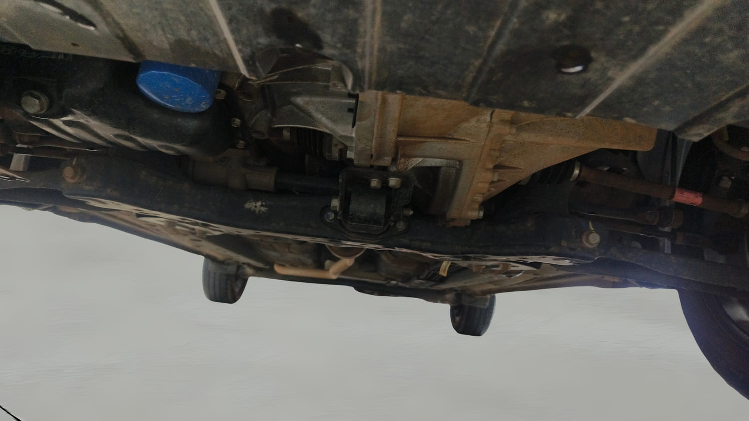 Used 2022 Hyundai Aura SX 1.2 Petrol Petrol Manual extra FRONT LEFT UNDERBODY VIEW