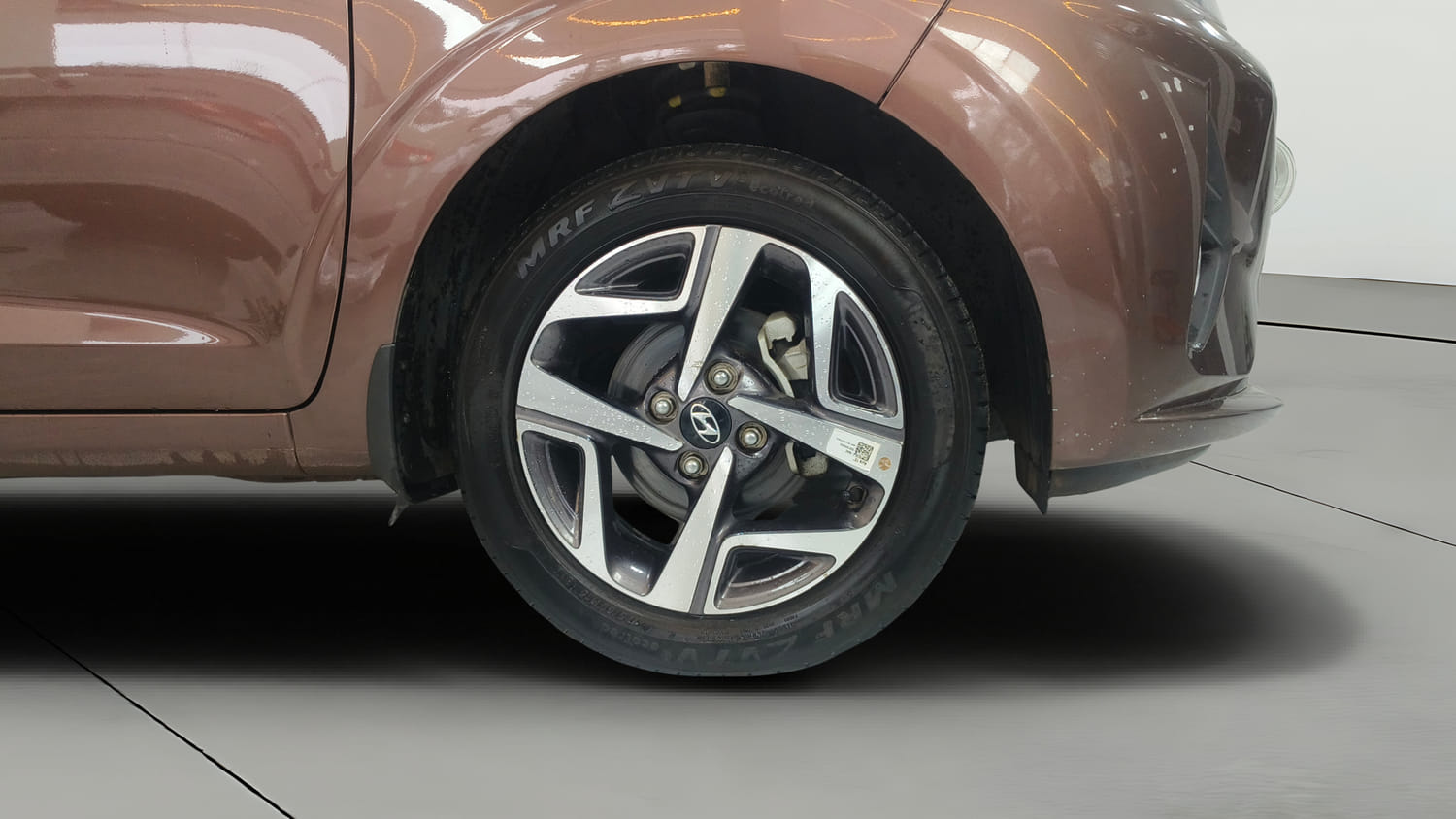 Used 2022 Hyundai Aura SX 1.2 Petrol Petrol Manual tyres RIGHT FRONT TYRE RIM VIEW