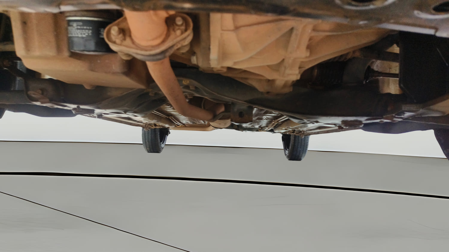 Used 2016 Maruti Suzuki Celerio VXi AMT Petrol Automatic extra FRONT LEFT UNDERBODY VIEW