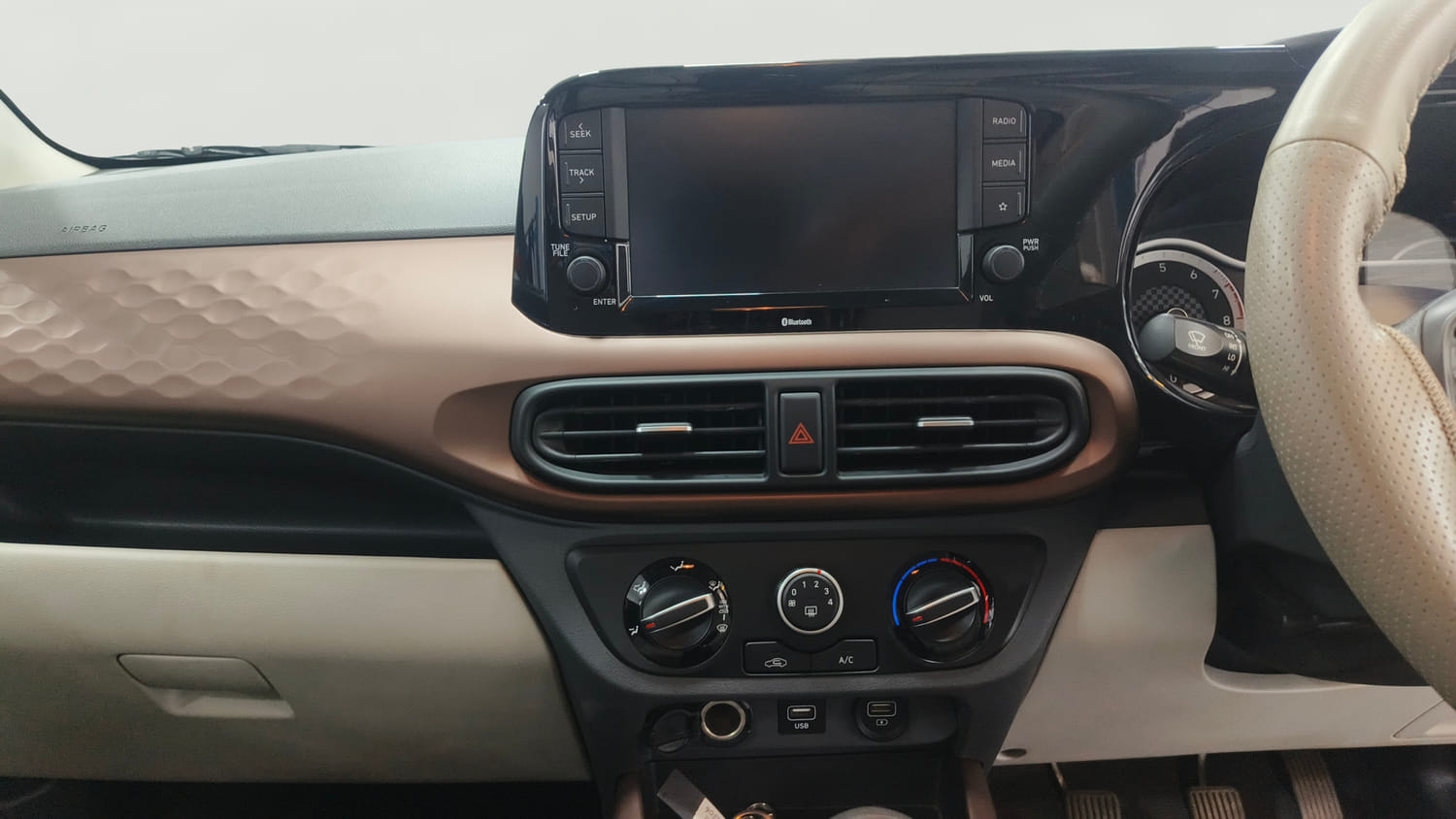 Used 2022 Hyundai Aura SX 1.2 Petrol Petrol Manual interior MUSIC SYSTEM & AC CONTROL VIEW