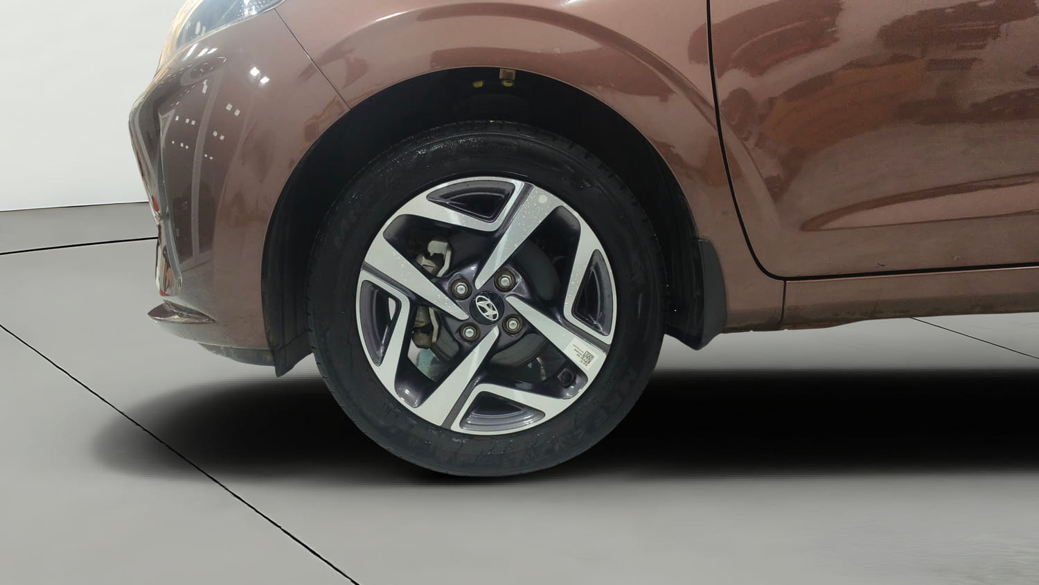 Used 2022 Hyundai Aura SX 1.2 Petrol Petrol Manual tyres LEFT FRONT TYRE RIM VIEW