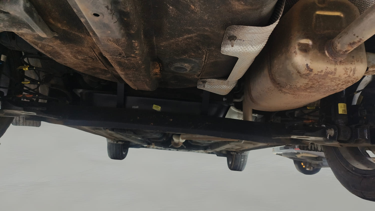 Used 2022 Hyundai Aura SX 1.2 Petrol Petrol Manual extra REAR UNDERBODY VIEW (TAKEN FROM REAR)