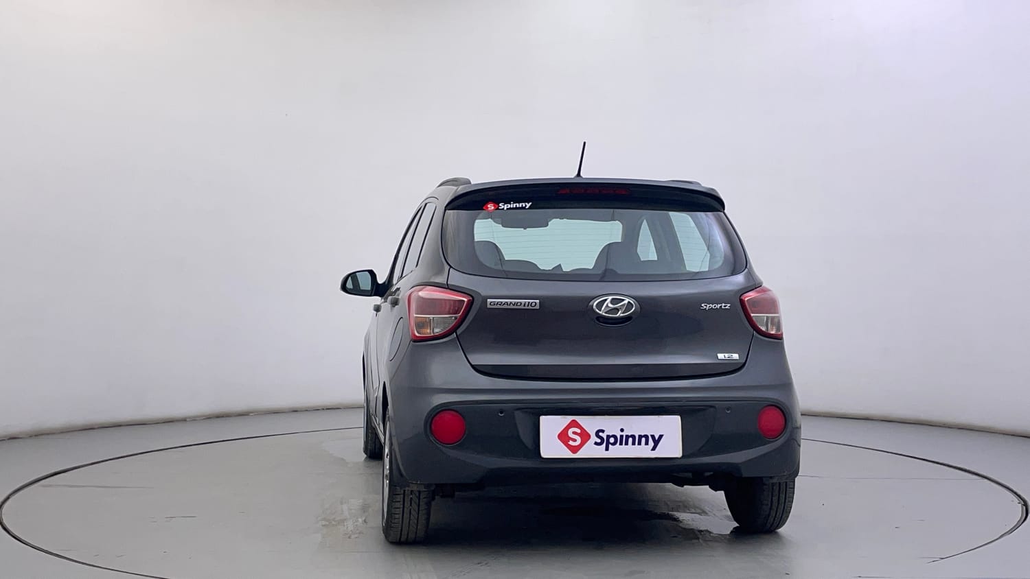 Used 2017 Hyundai Grand i10 Sportz (O) AT 1.2 Kappa VTVT Petrol Automatic exterior BACK VIEW