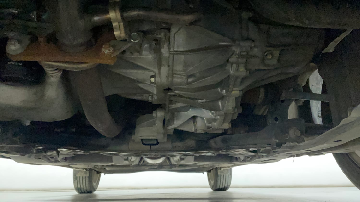 Used 2022 Maruti Suzuki Baleno Zeta AGS Petrol Automatic extra FRONT LEFT UNDERBODY VIEW