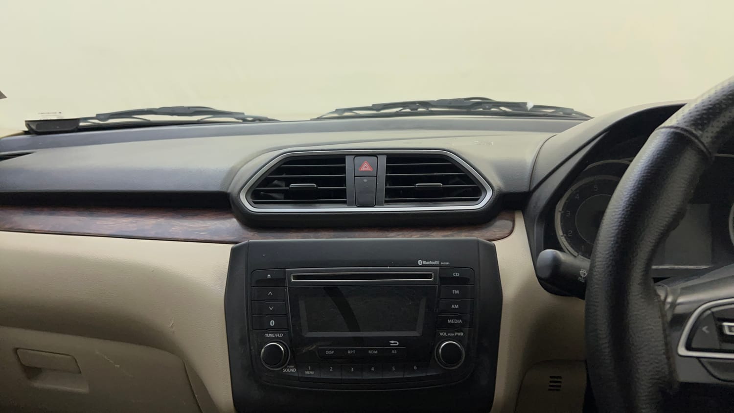 Used 2018 Maruti Suzuki Dzire VXi AMT Petrol Automatic top_features Integrated (in-dash) music system