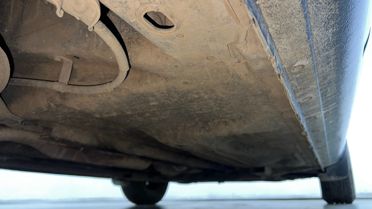 Used 2013 Nissan Sunny XL Petrol Manual extra REAR RIGHT UNDERBODY VIEW