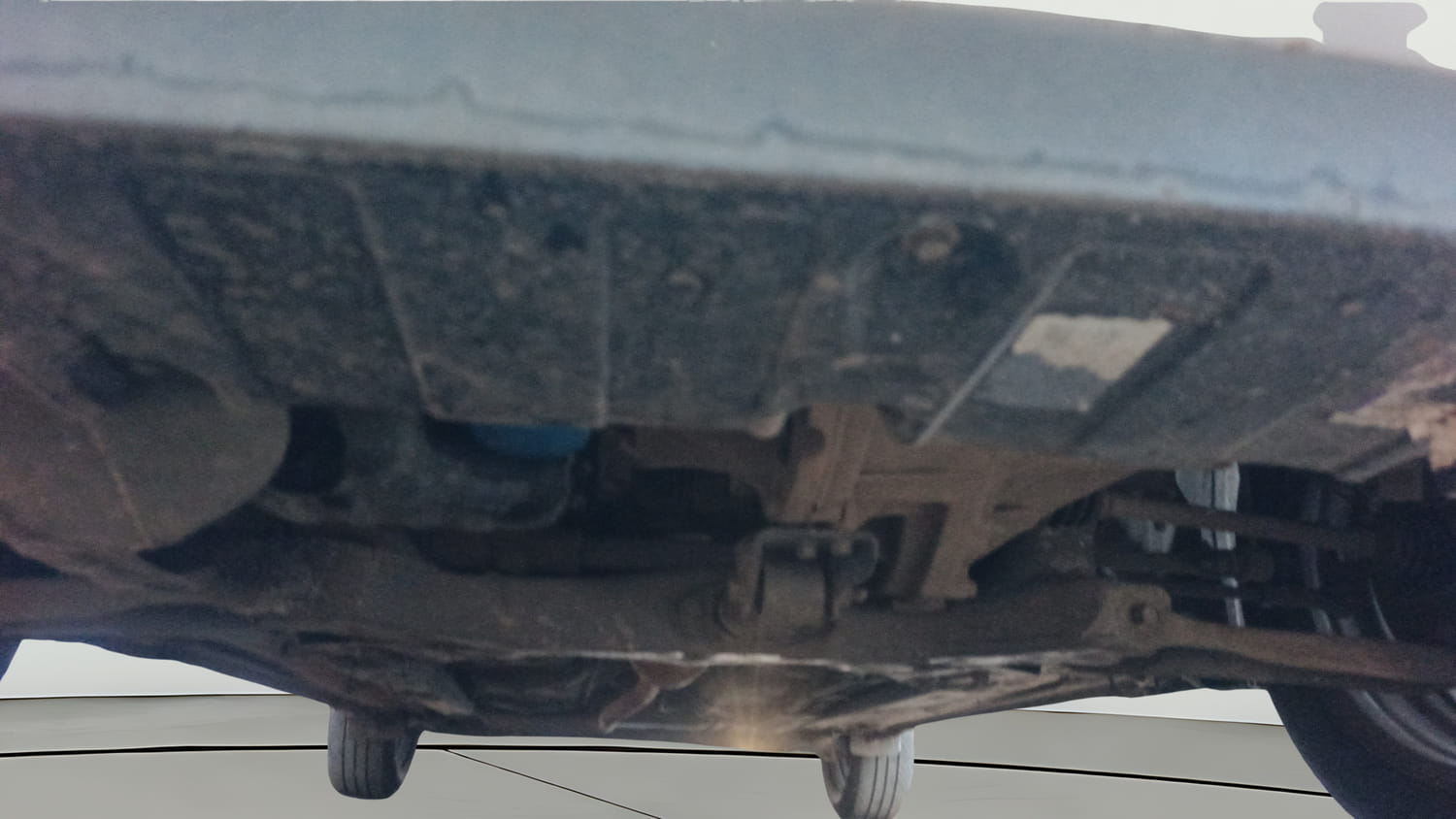 Used 2024 Hyundai Aura S 1.2 Petrol Petrol Manual extra FRONT LEFT UNDERBODY VIEW