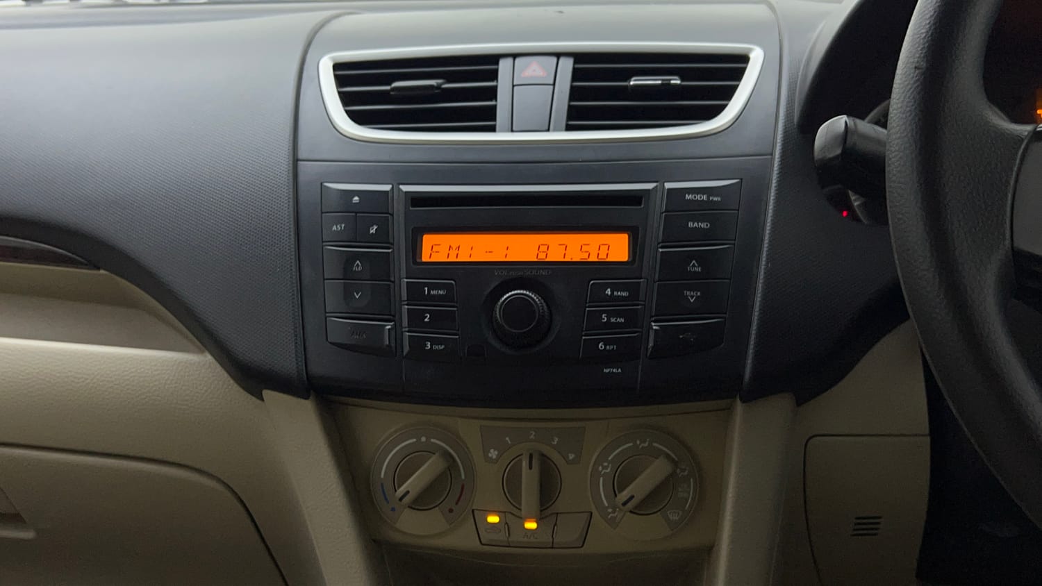 Used 2014 Maruti Suzuki Swift Dzire VXI Petrol Manual top_features Integrated (in-dash) music system