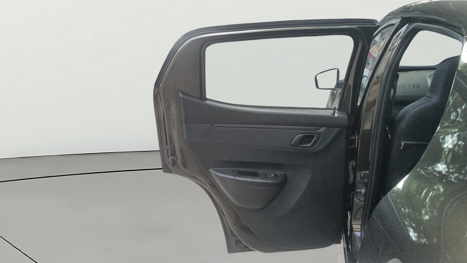 Used 2025 Renault Kwid RXT 1.0L Petrol Manual interior LEFT REAR DOOR OPEN VIEW