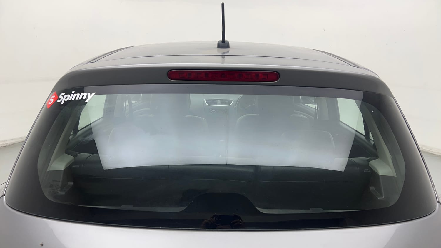 Used 2017 Maruti Suzuki Swift Lxi (O) Petrol Manual exterior BACK WINDSHIELD VIEW