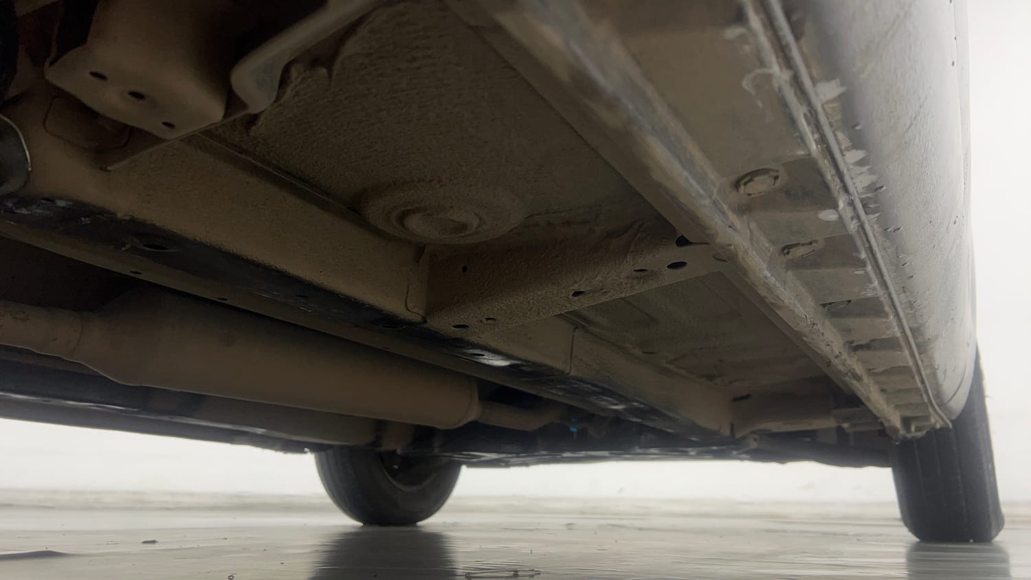Used 2013 Maruti Suzuki Swift Dzire VXI Petrol Manual extra REAR RIGHT UNDERBODY VIEW