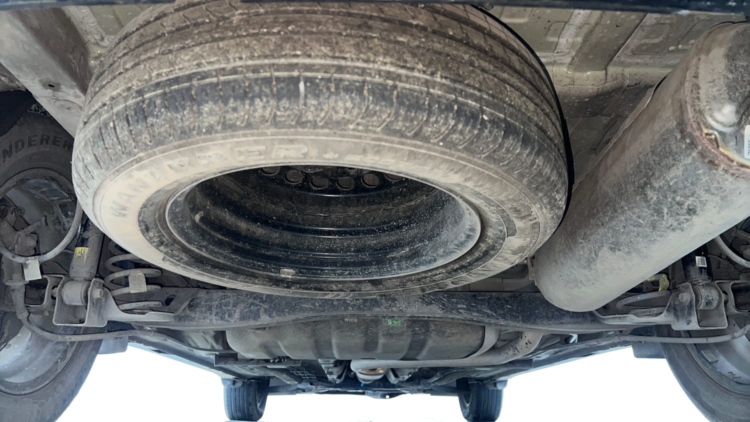 Used 2022 Kia Carens Prestige Plus 1.4 Petrol DCT 7 STR Petrol Automatic extra REAR UNDERBODY VIEW (TAKEN FROM REAR)