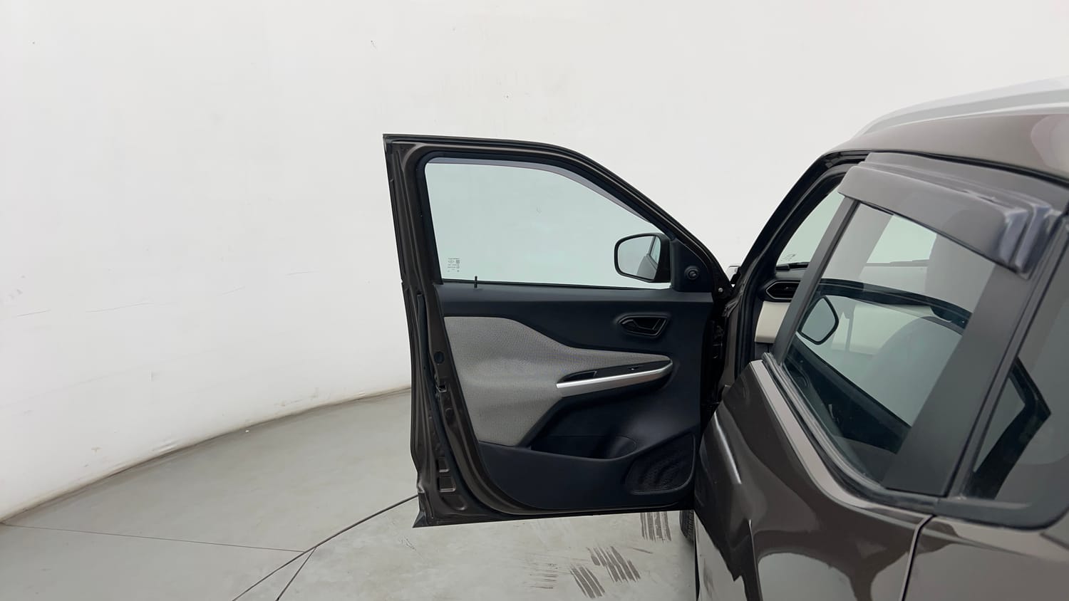 Used 2023 Nissan Magnite XE Petrol Manual interior LEFT FRONT DOOR OPEN VIEW