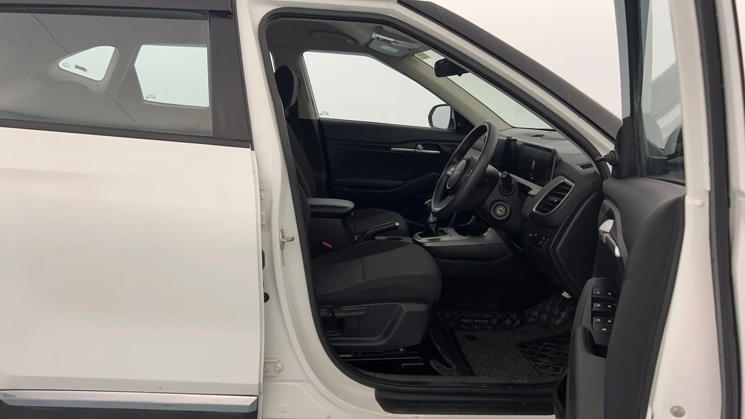 Used 2024 Kia Seltos HTE 1.5 Diesel MT Diesel Manual interior RIGHT SIDE FRONT DOOR CABIN VIEW