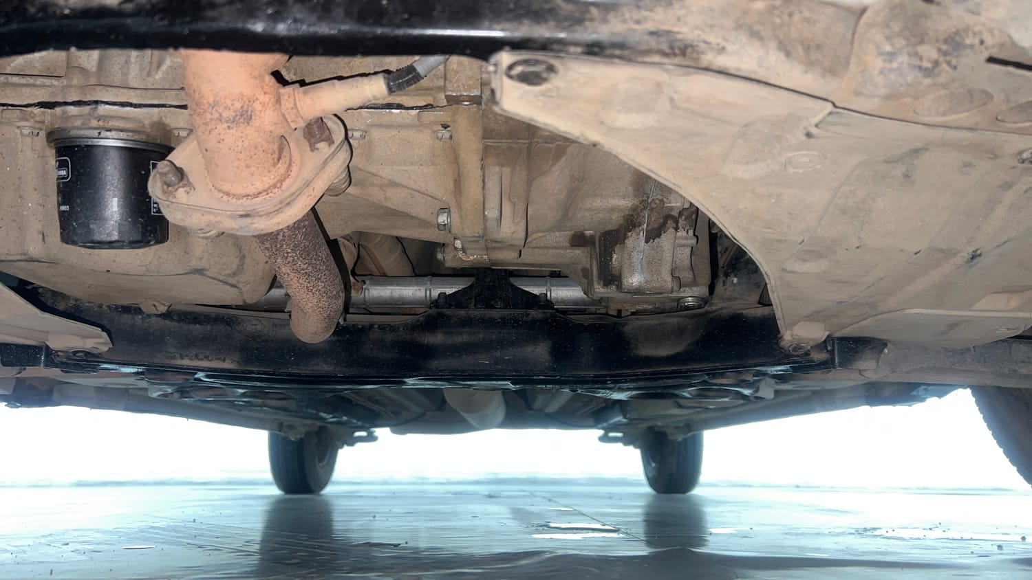 Used 2013 Maruti Suzuki Swift Dzire VXI Petrol Manual extra FRONT LEFT UNDERBODY VIEW