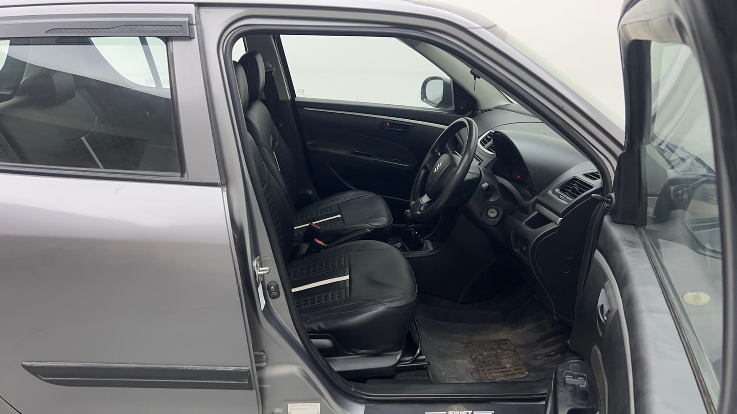 Used 2017 Maruti Suzuki Swift Lxi (O) Petrol Manual interior RIGHT SIDE FRONT DOOR CABIN VIEW