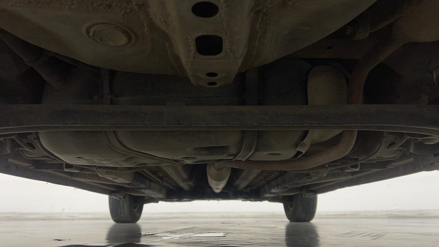 Used 2017 Maruti Suzuki Swift Lxi (O) Petrol Manual extra REAR UNDERBODY VIEW (TAKEN FROM REAR)