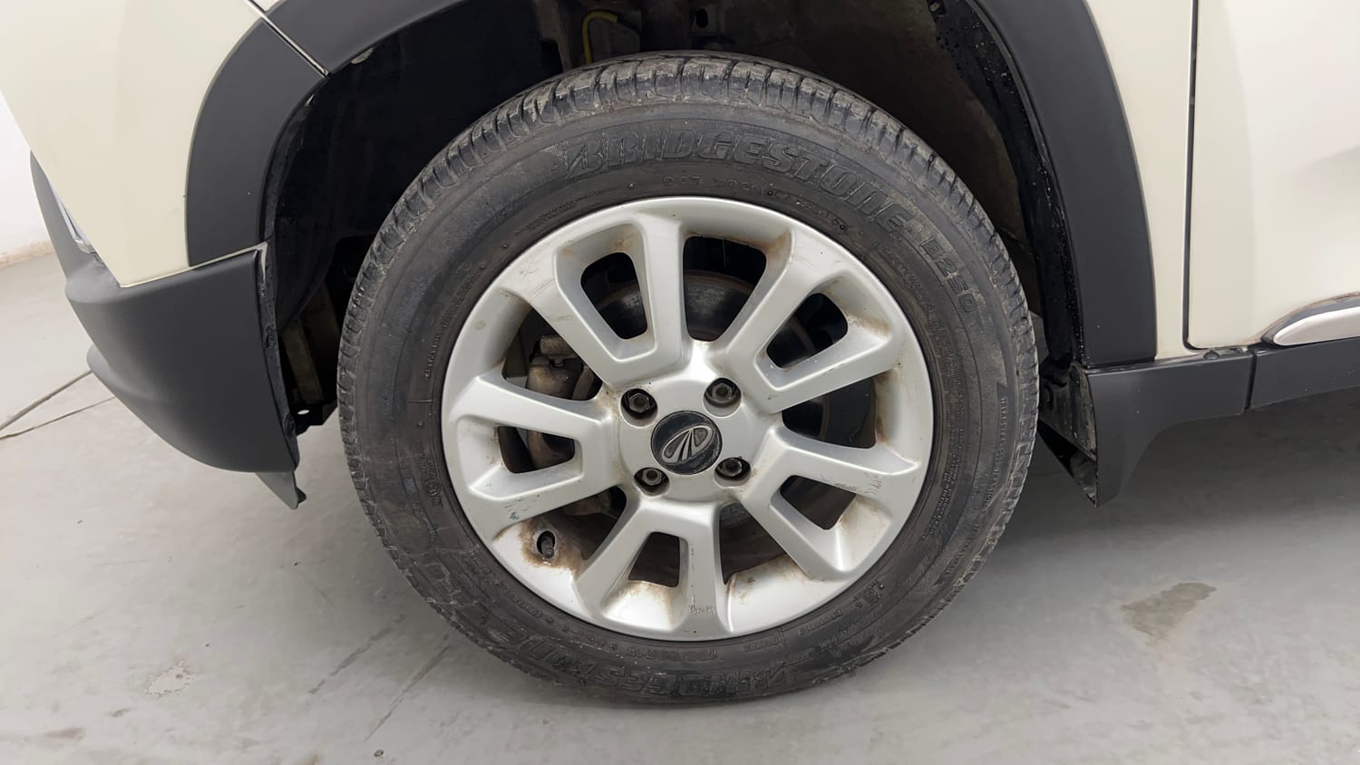 Used 2017 Mahindra KUV100 K8 6 STR Petrol Manual tyres LEFT FRONT TYRE RIM VIEW