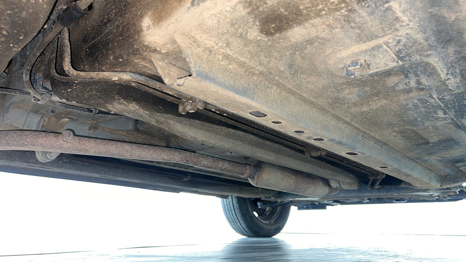 Used 2023 Nissan Magnite XE Petrol Manual extra REAR RIGHT UNDERBODY VIEW