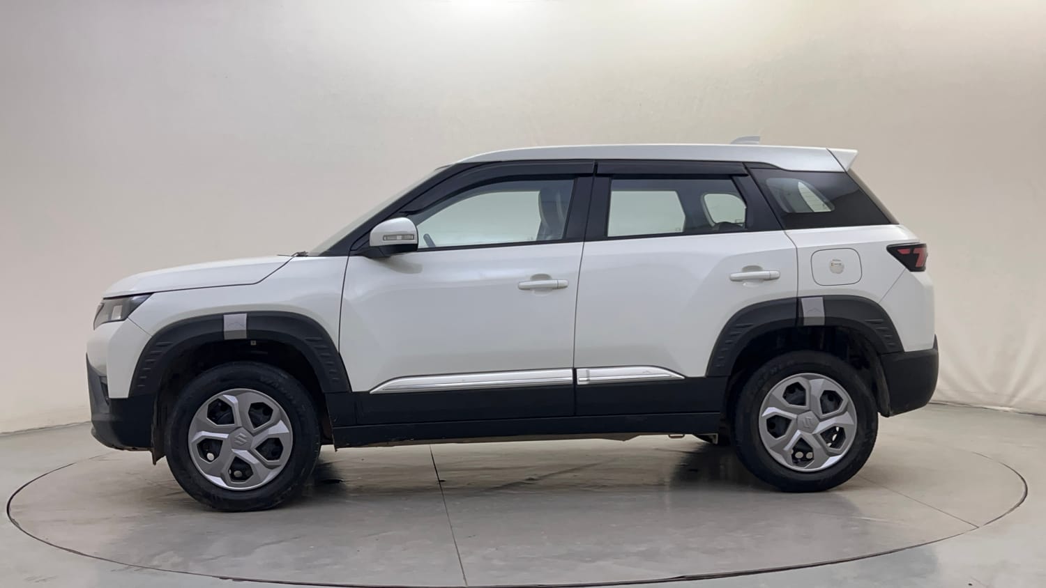 Used 2024 Maruti Suzuki Brezza VXi Petrol Manual exterior LEFT SIDE VIEW
