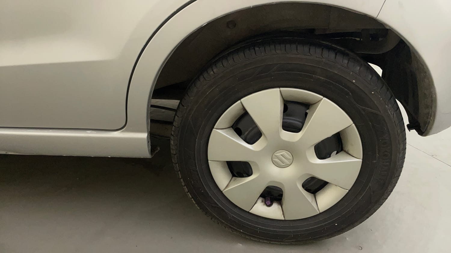 Used 2013 Maruti Suzuki A-Star VXI AT Petrol Automatic tyres LEFT REAR TYRE RIM VIEW