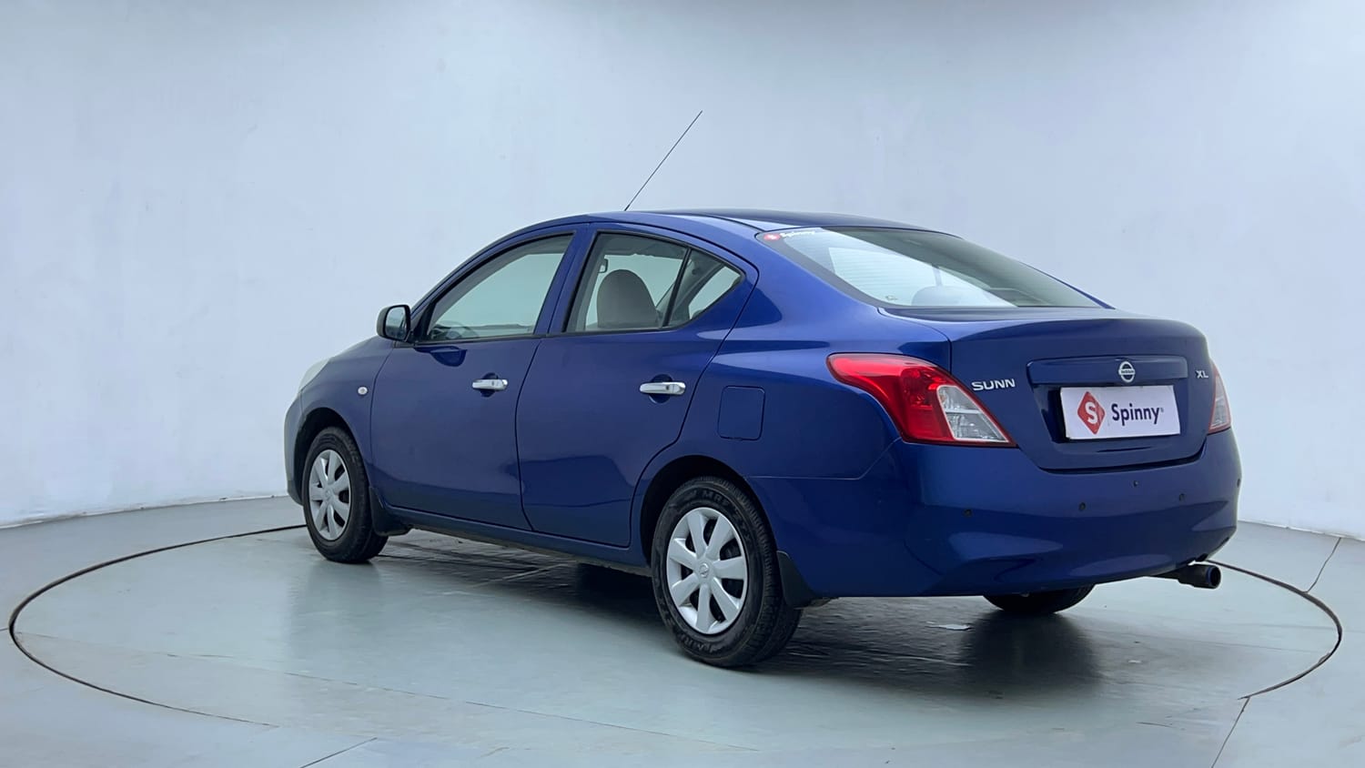 Used 2013 Nissan Sunny XL Petrol Manual exterior LEFT REAR CORNER VIEW