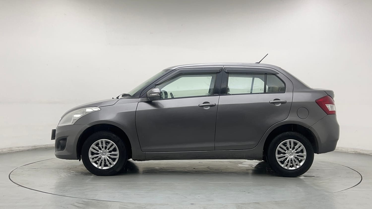 Used 2013 Maruti Suzuki Swift Dzire VXI Petrol Manual exterior LEFT SIDE VIEW