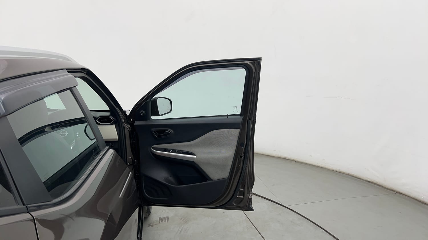 Used 2023 Nissan Magnite XE Petrol Manual interior RIGHT FRONT DOOR OPEN VIEW