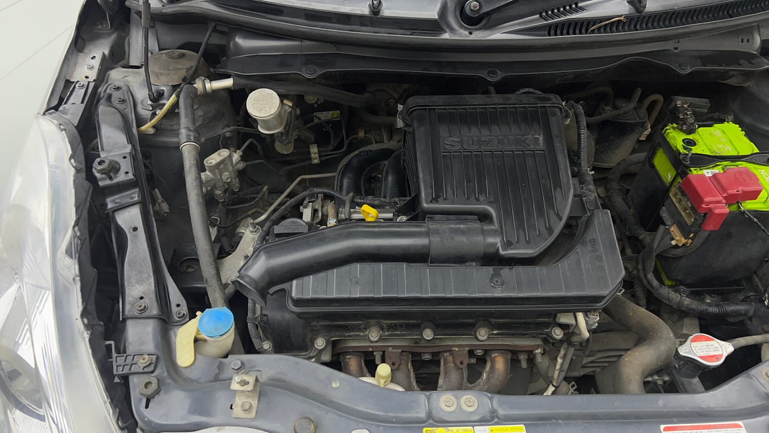 Used 2017 Maruti Suzuki Swift Lxi (O) Petrol Manual engine ENGINE RIGHT SIDE VIEW