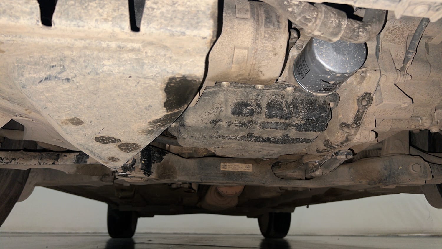 Used 2023 Volkswagen Taigun Topline 1.0 TSI MT Petrol Manual extra FRONT LEFT UNDERBODY VIEW