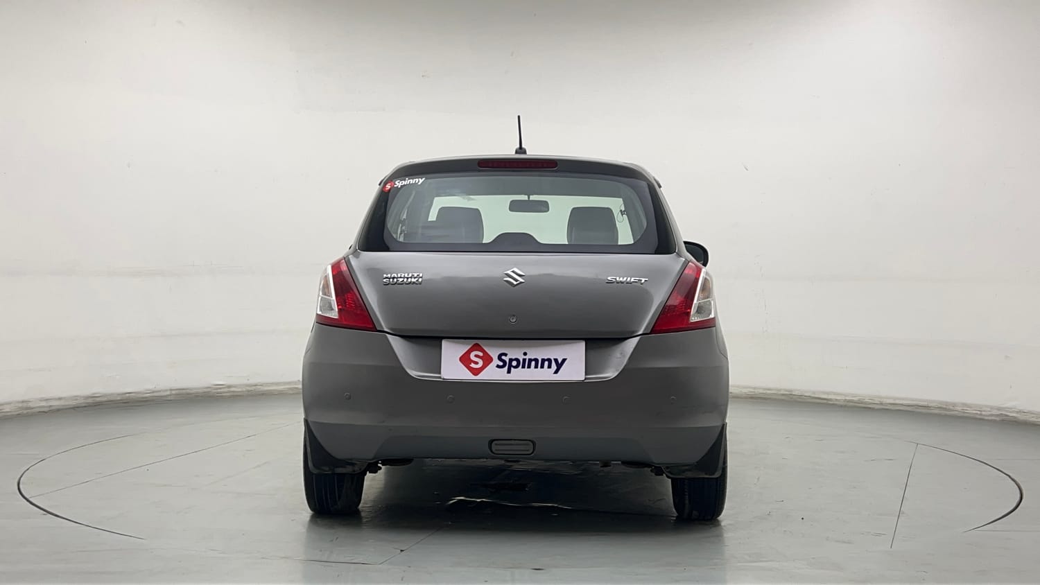 Used 2017 Maruti Suzuki Swift Lxi (O) Petrol Manual exterior BACK VIEW