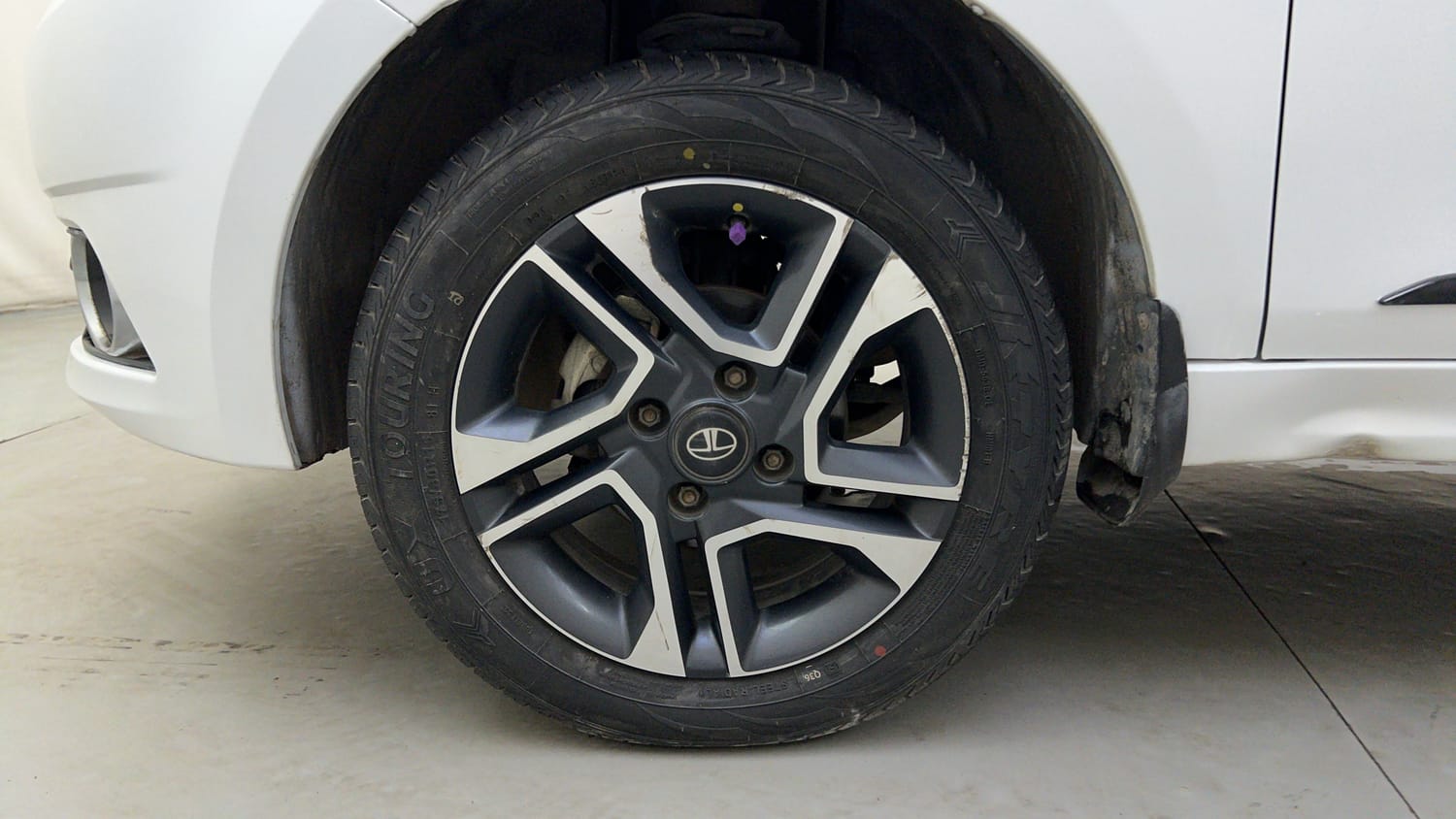 Used 2019 Tata Tiago Revotron XZ Plus Petrol Manual tyres LEFT FRONT TYRE RIM VIEW