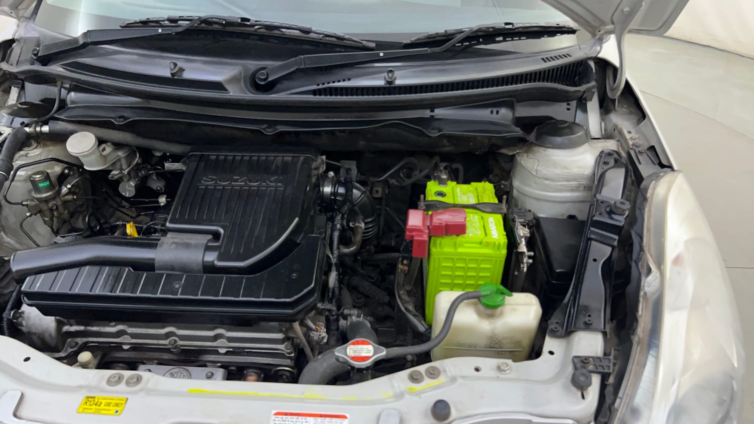 Used 2012 Maruti Suzuki Swift VXi Petrol Manual engine ENGINE LEFT SIDE HINGE & APRON VIEW