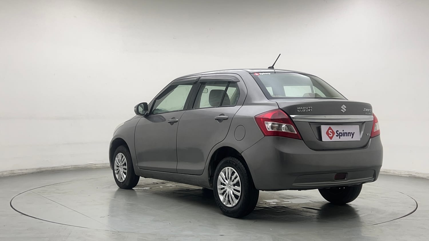 Used 2013 Maruti Suzuki Swift Dzire VXI Petrol Manual exterior LEFT REAR CORNER VIEW