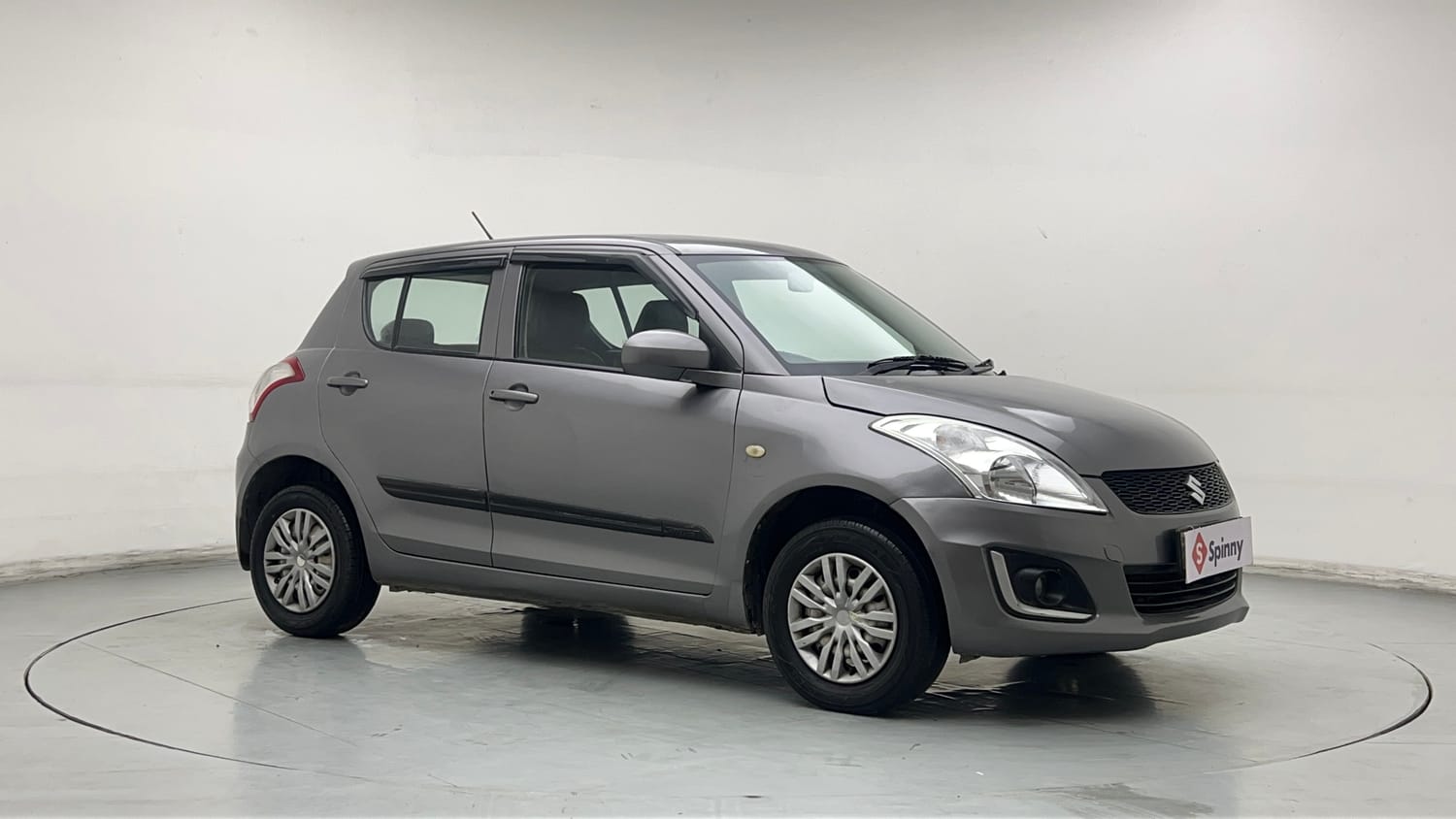 Used 2017 Maruti Suzuki Swift Lxi (O) Petrol Manual exterior RIGHT FRONT CORNER VIEW