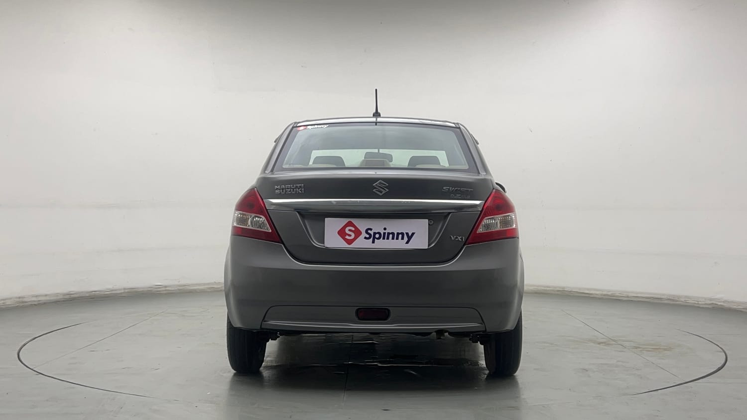 Used 2013 Maruti Suzuki Swift Dzire VXI Petrol Manual exterior BACK VIEW