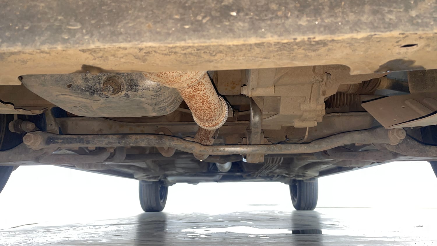 Used 2022 Tata Tigor XZ Plus CNG Cng Manual extra FRONT LEFT UNDERBODY VIEW