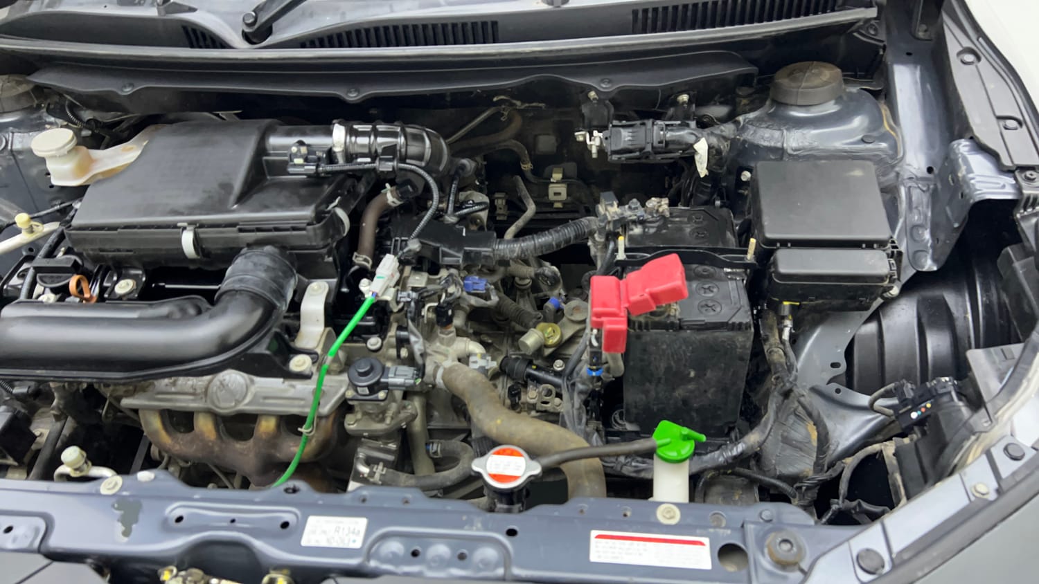Used 2023 Maruti Suzuki Baleno Delta MT Petrol Manual engine ENGINE LEFT SIDE VIEW