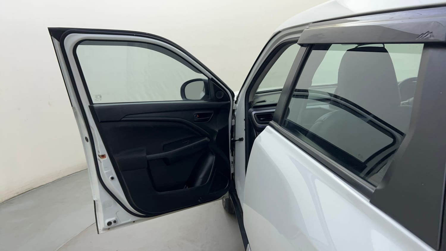 Used 2024 Maruti Suzuki Brezza VXi Petrol Manual interior LEFT FRONT DOOR OPEN VIEW