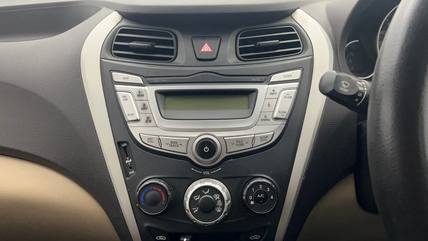 Used 2017 Hyundai Eon Sportz Petrol Manual top_features Integrated (in-dash) music system