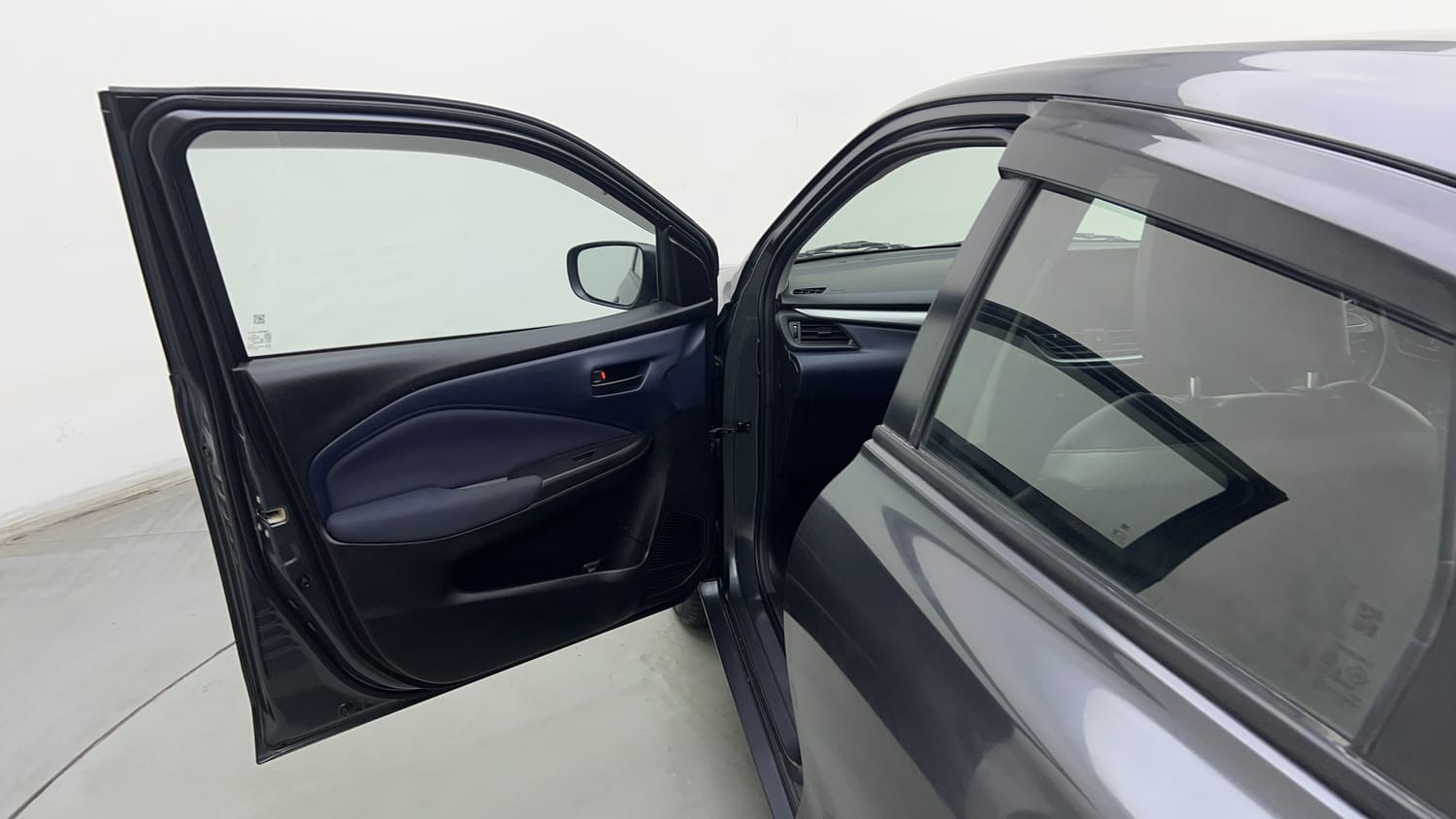 Used 2023 Maruti Suzuki Baleno Delta MT Petrol Manual interior LEFT FRONT DOOR OPEN VIEW