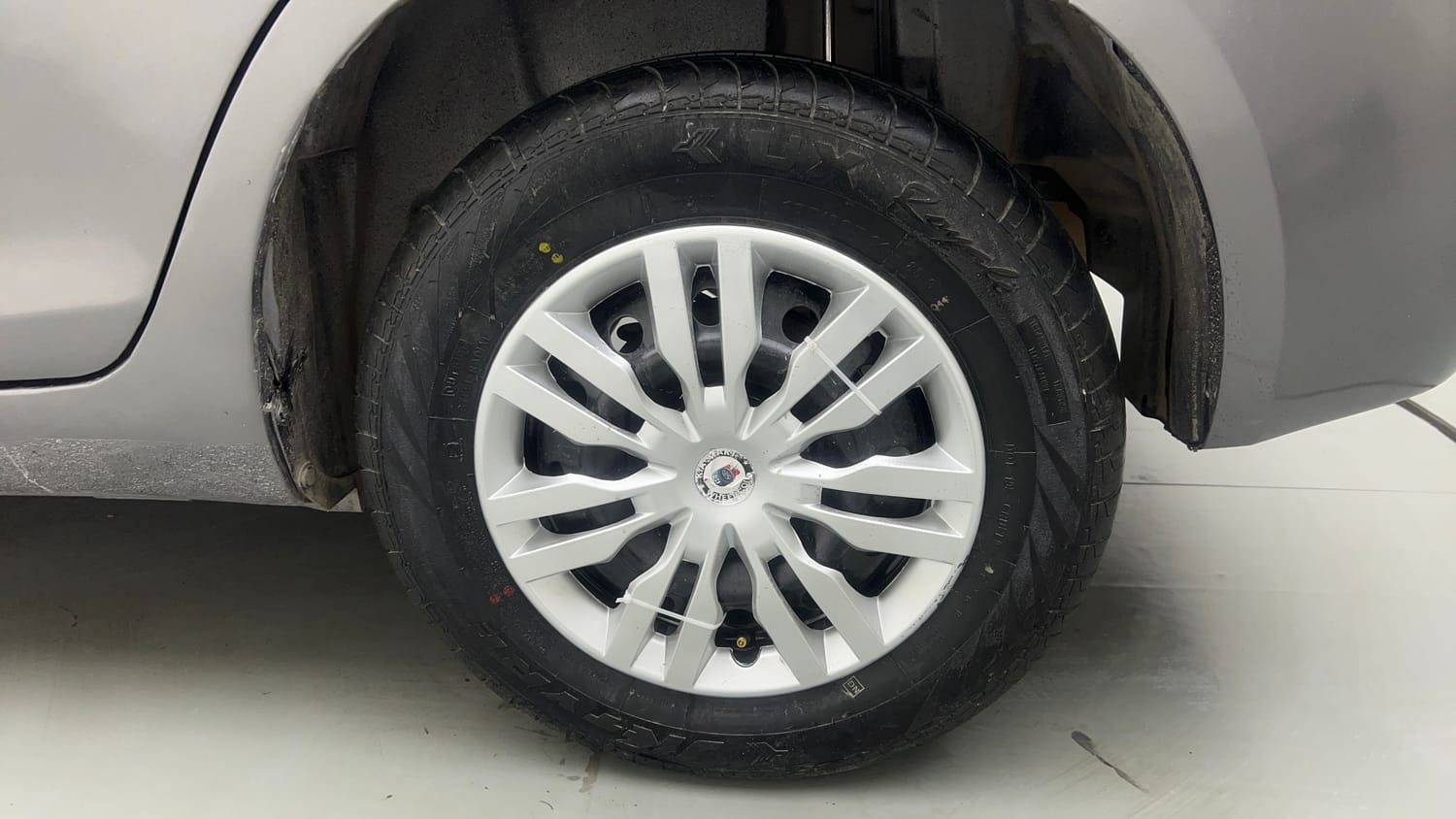 Used 2013 Maruti Suzuki Swift Dzire VXI Petrol Manual tyres LEFT REAR TYRE RIM VIEW
