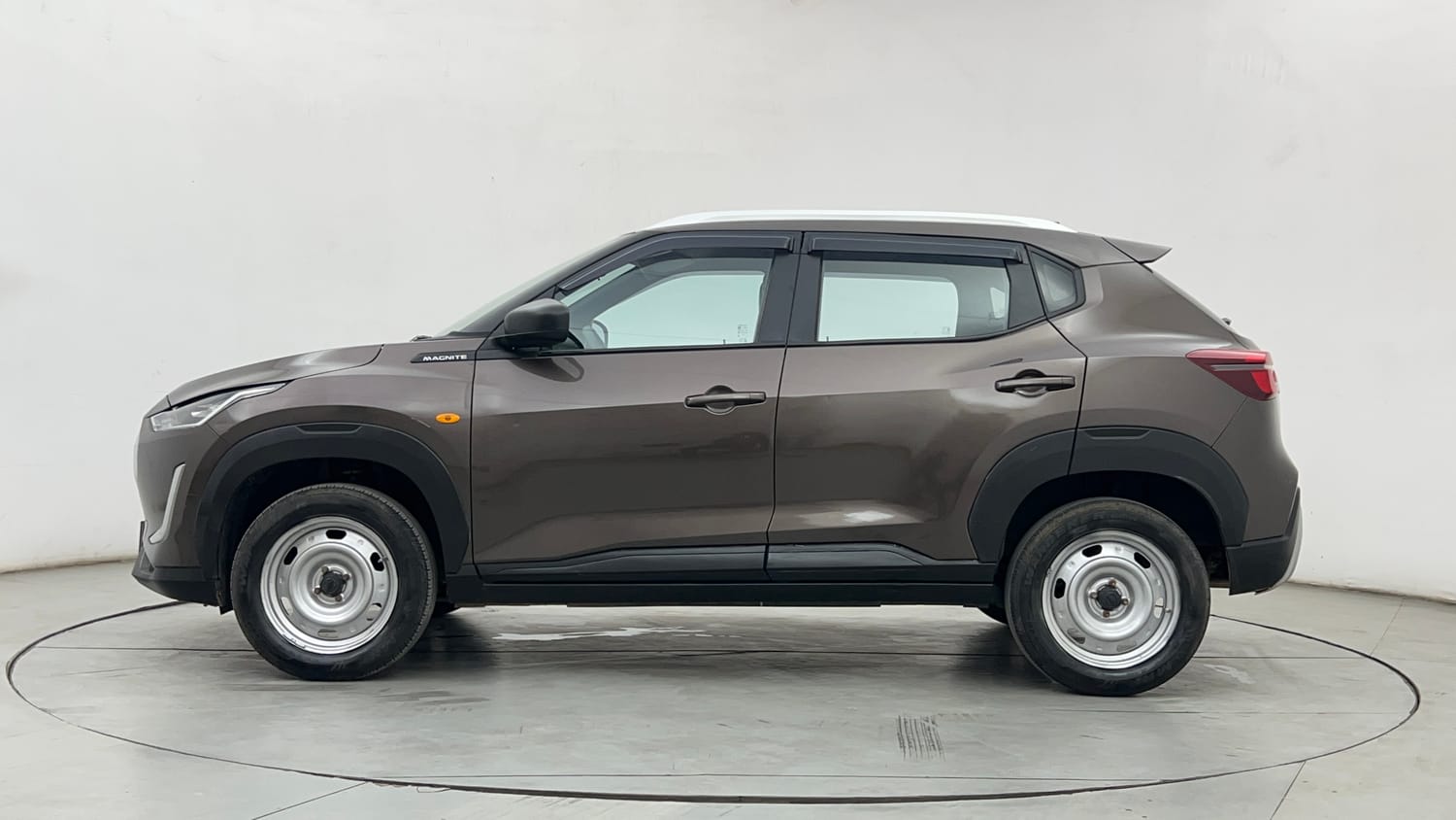 Used 2023 Nissan Magnite XE Petrol Manual exterior LEFT SIDE VIEW
