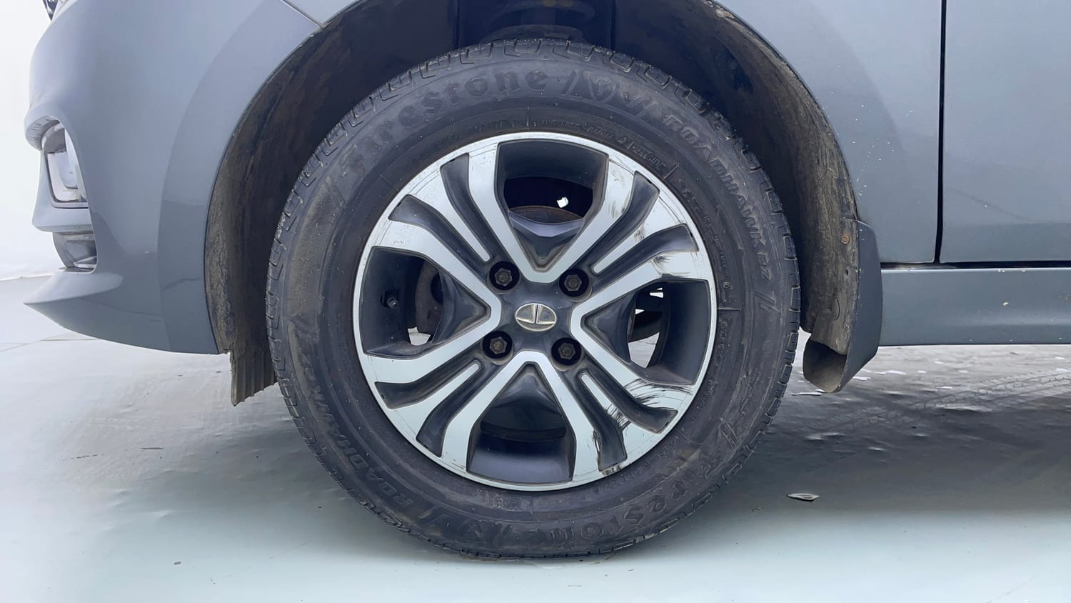 Used 2022 Tata Tigor XZ Plus CNG Cng Manual tyres LEFT FRONT TYRE RIM VIEW