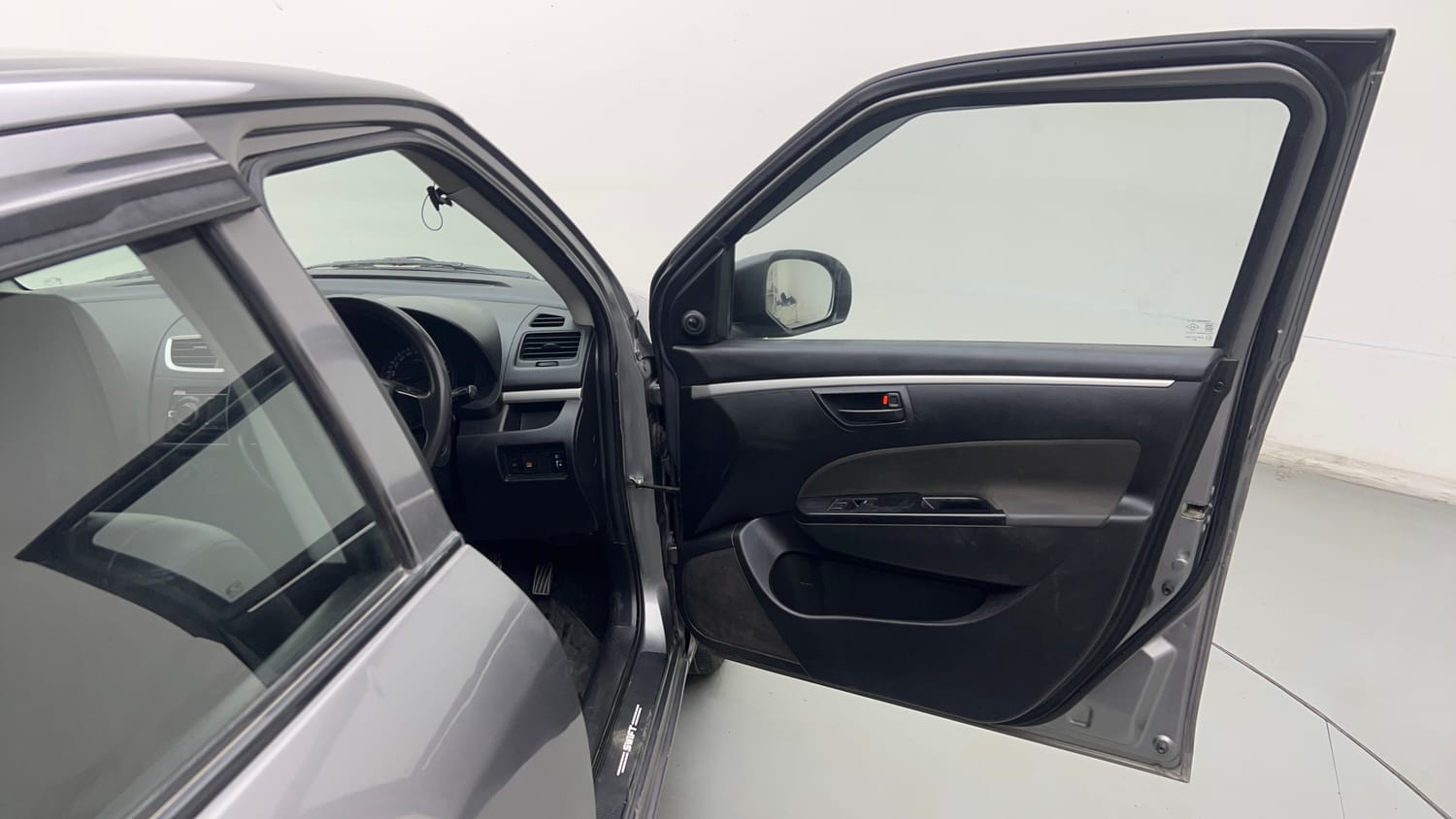Used 2017 Maruti Suzuki Swift Lxi (O) Petrol Manual interior RIGHT FRONT DOOR OPEN VIEW